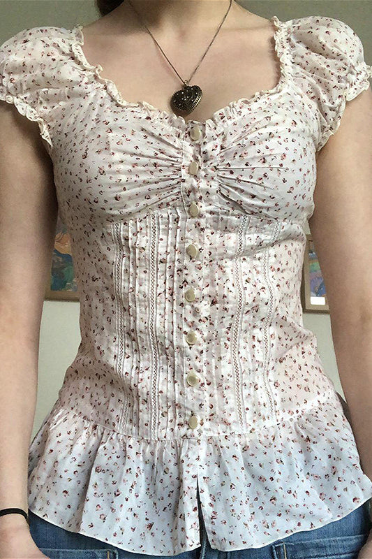Vintage-Bluse mit Blumenmuster, Bindeknöpfen und Puffärmeln