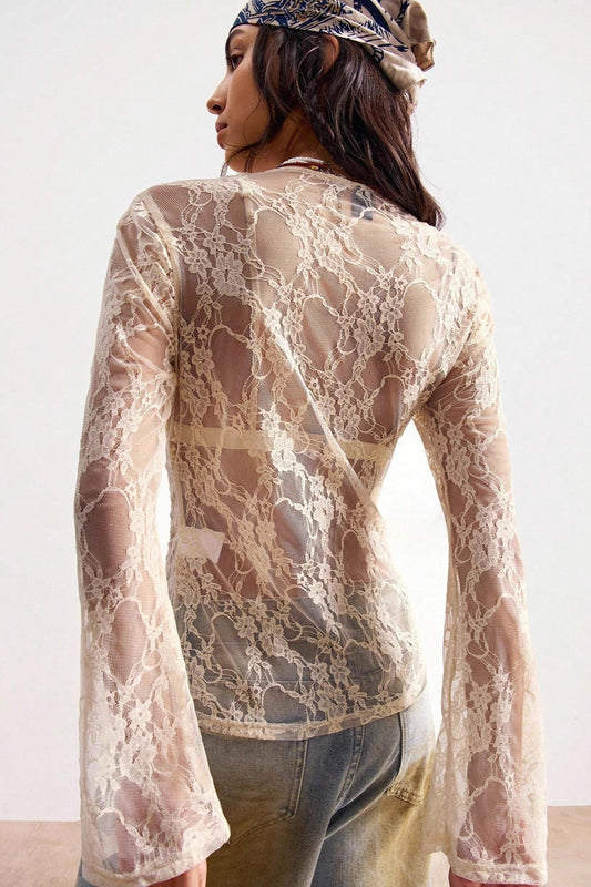 Transparente, figurbetonte Bluse aus Spitze
