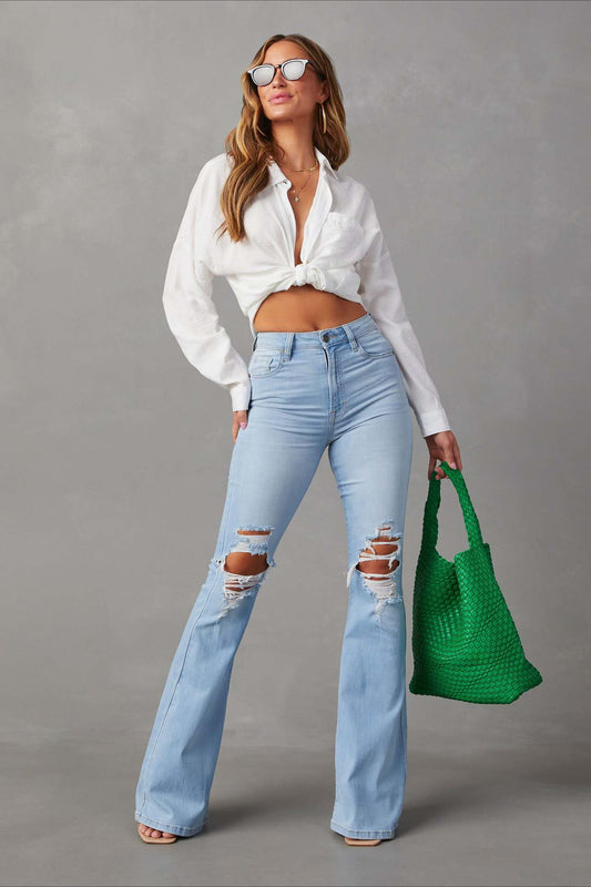 Zerrissene Schlagjeans mit hoher Taille