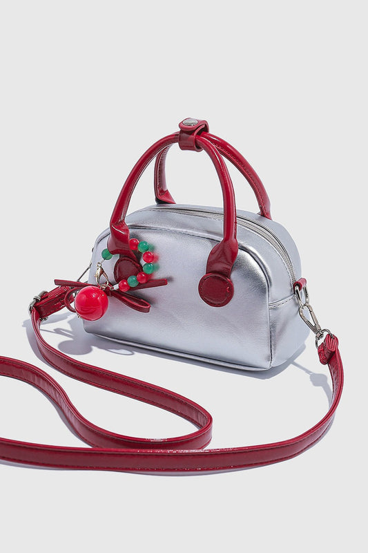 Minimalistische Kissen-Handtasche im Farbblock-Design