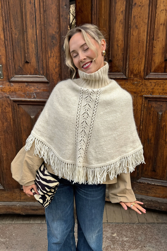 Fringe Trim Turtleneck Poncho Sweater