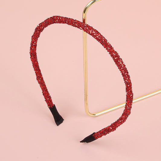 Strassglitzerndes Haaraccessoire in Rot und Grün für Partys