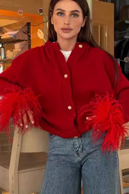 Elegante Strickjacke mit Federbesatz