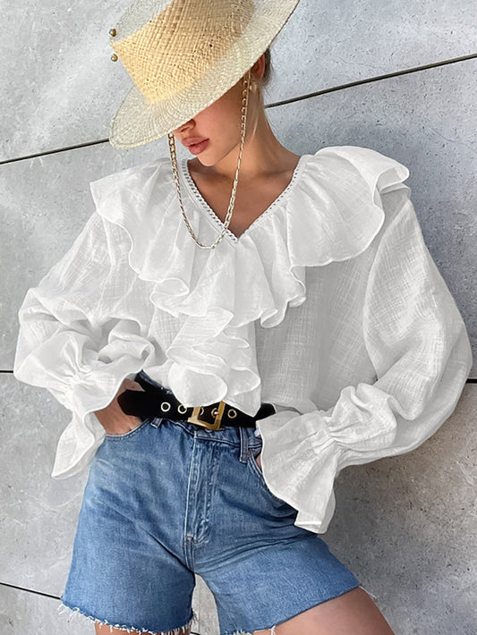 Baumwollbluse mit überschnittenen Schultern und Rüschen