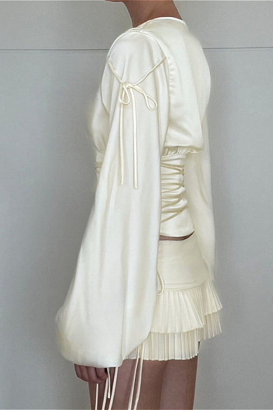 Vintage Langarmshirt aus hochelastischem Satin mit tailliertem Bund und elastischem Bund