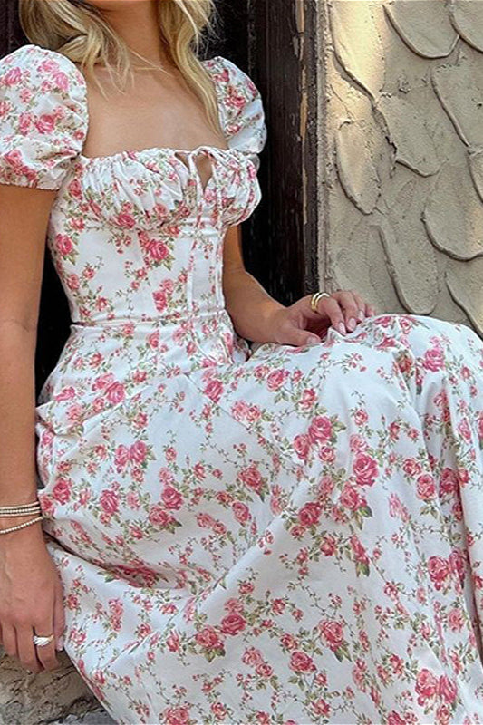 Elegantes Vintage-Kleid mit Blumenmuster und Puffärmeln