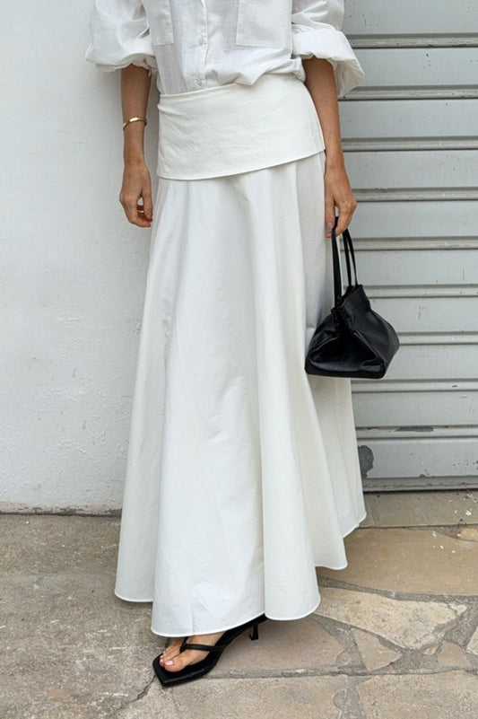 Einfarbiger Midirock in A-Linie