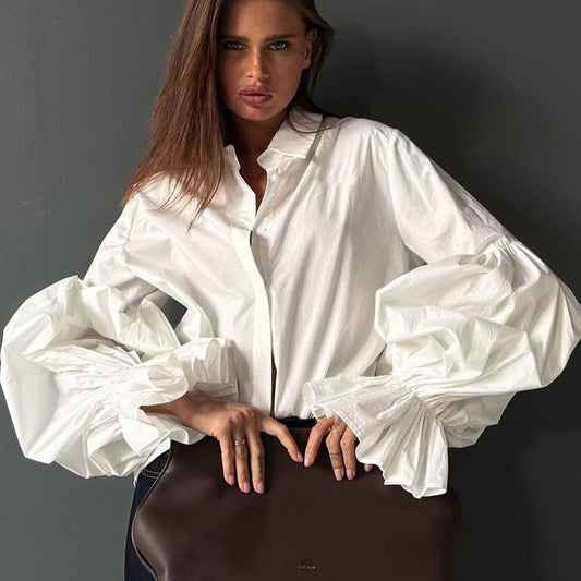 Locker sitzende Bluse mit Laternenärmeln und Revers