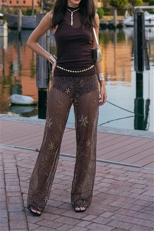 Transparente Hose mit weitem Bein und Pailletten