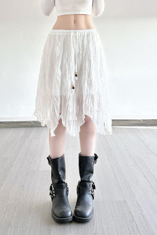 Asymmetrischer Minirock mit Perlen