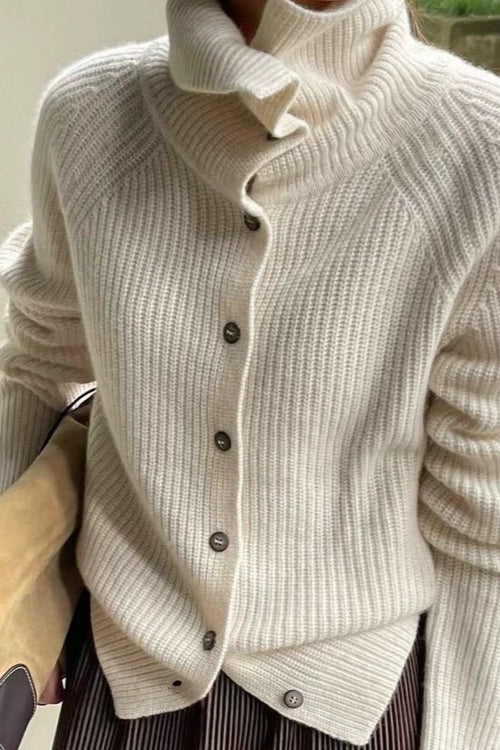 Retro-Strickjacke mit strukturiertem Rippstrickmuster, schmaler Passform, einreihiger Knopfleiste und lockerem Schnitt.