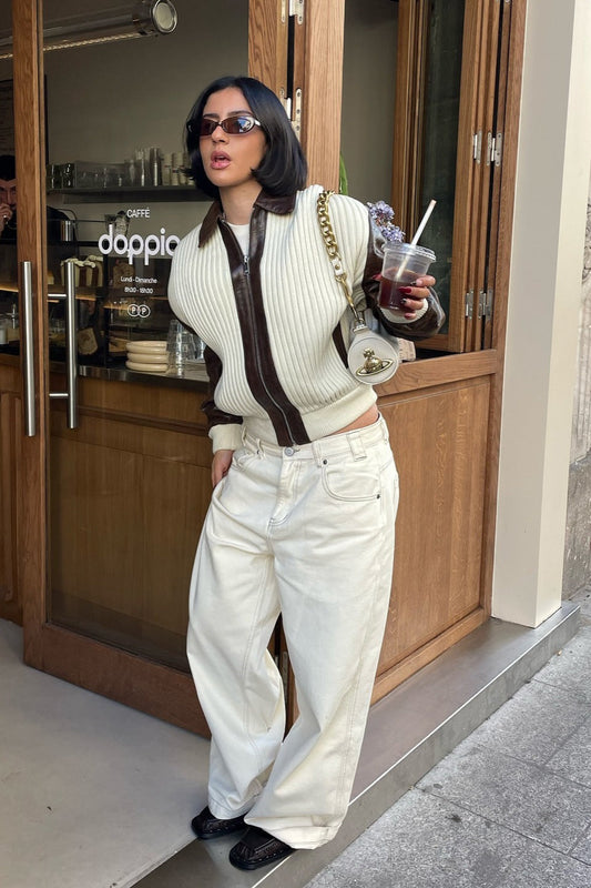 Langärmlige Strick- und Lederjacke