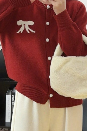 Rundhals-Strickjacke mit weicher Schleife und Jacquardmuster