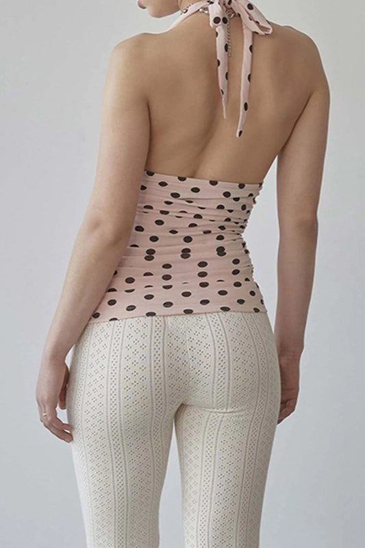 Neckholder-Bluse mit Punkten und V-Ausschnitt