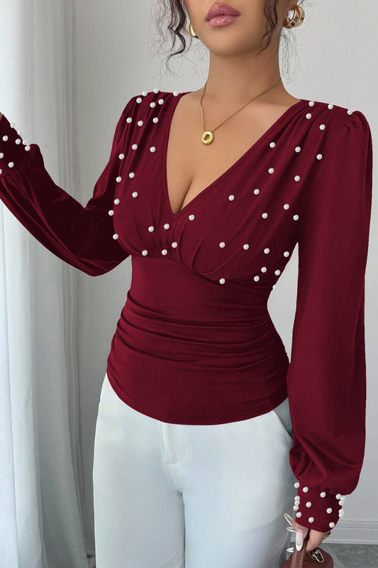 Perlenbesetztes, einfarbiges Langarmshirt mit V-Ausschnitt, geraffter Taille und sexy Details