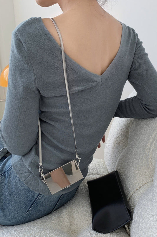 Elegantes, figurbetontes Stricktop mit Rollkragen