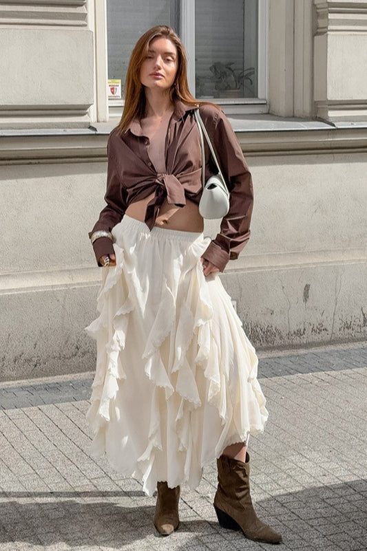 Aprikosenfarbener Rüschenrock mit elegantem Spitzenbesatz