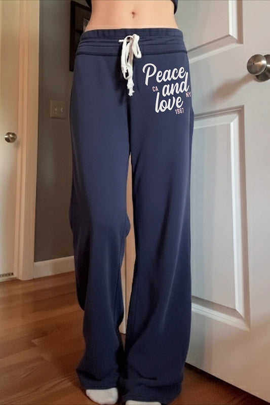 Schicke Hose mit kontrastierendem Buchstabenprint, elastischem Bund und lockerem, geradem Schnitt