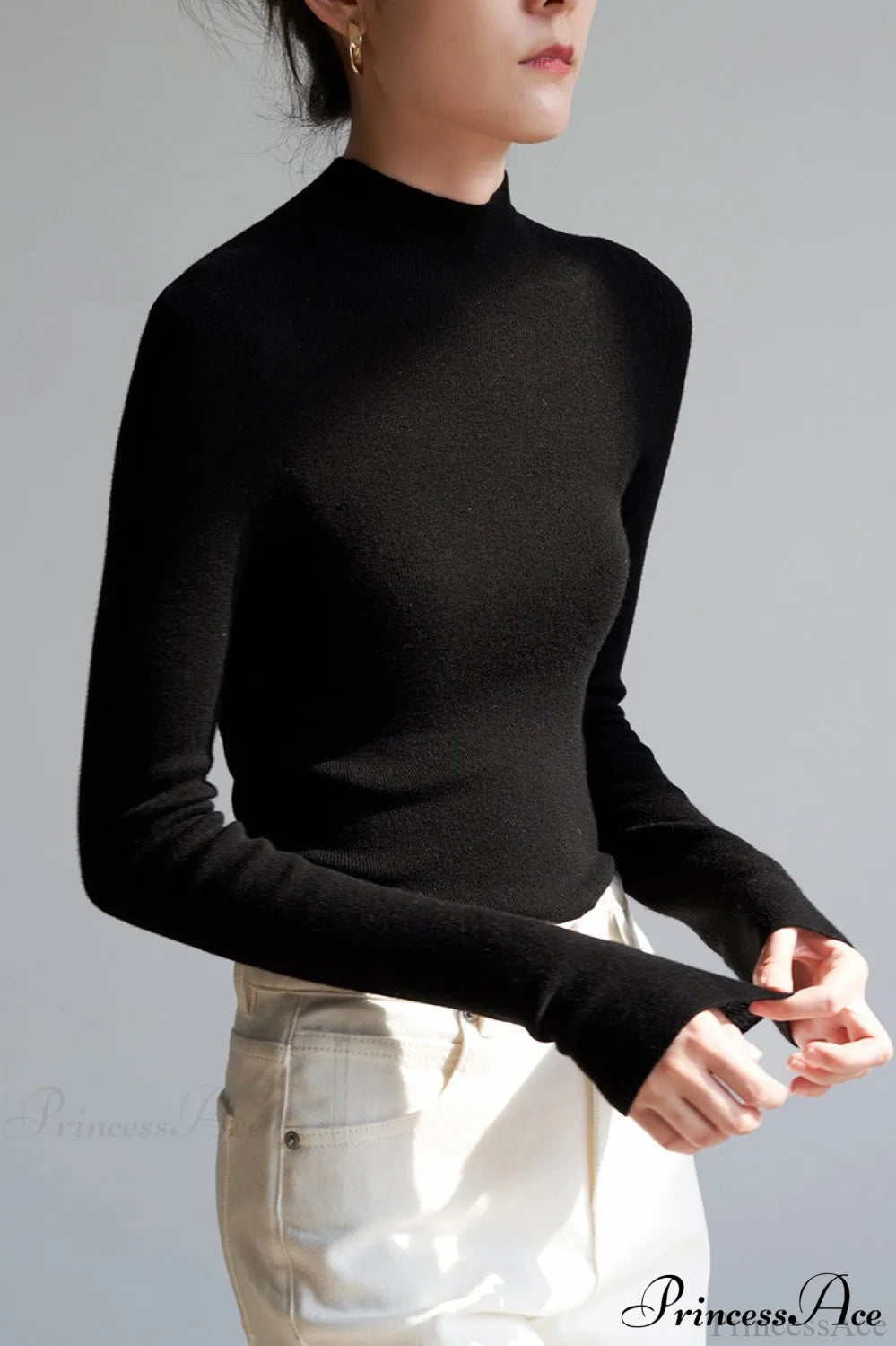 CorpCore Seamless Mock Neck Wool Knit Top Black / One Size