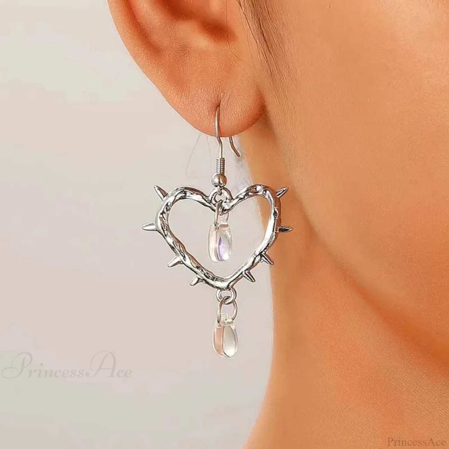 Dark Spiky Ebony Flow Oil Love Earring White