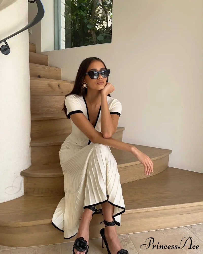 Knit Two Tone Short Sleeve Buttoned Modern Top And Pleated Midi Skirt Set