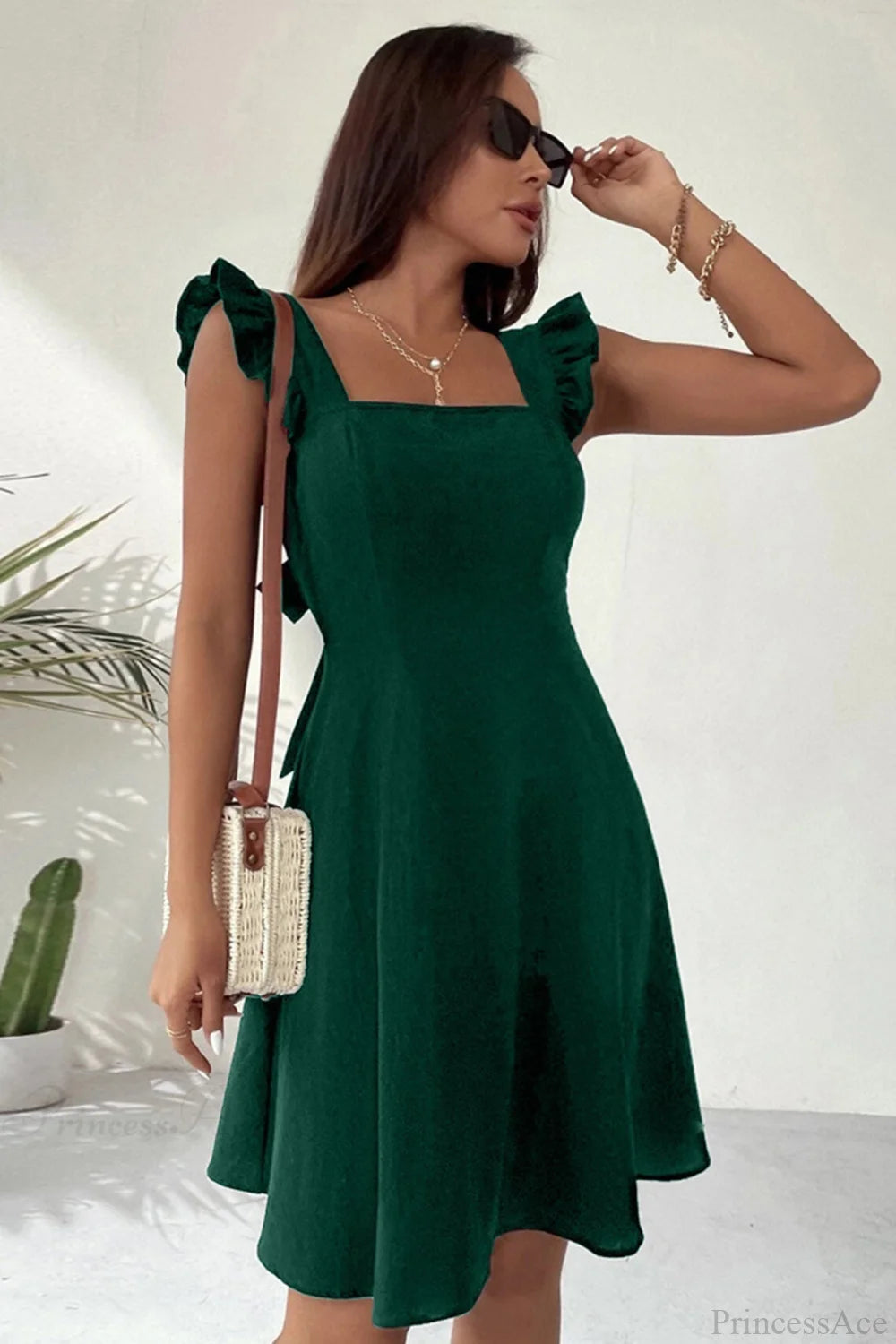 Sleeveless Mini Dress With Ruffle Detail And Tie-Back Dark Green / S Dresses