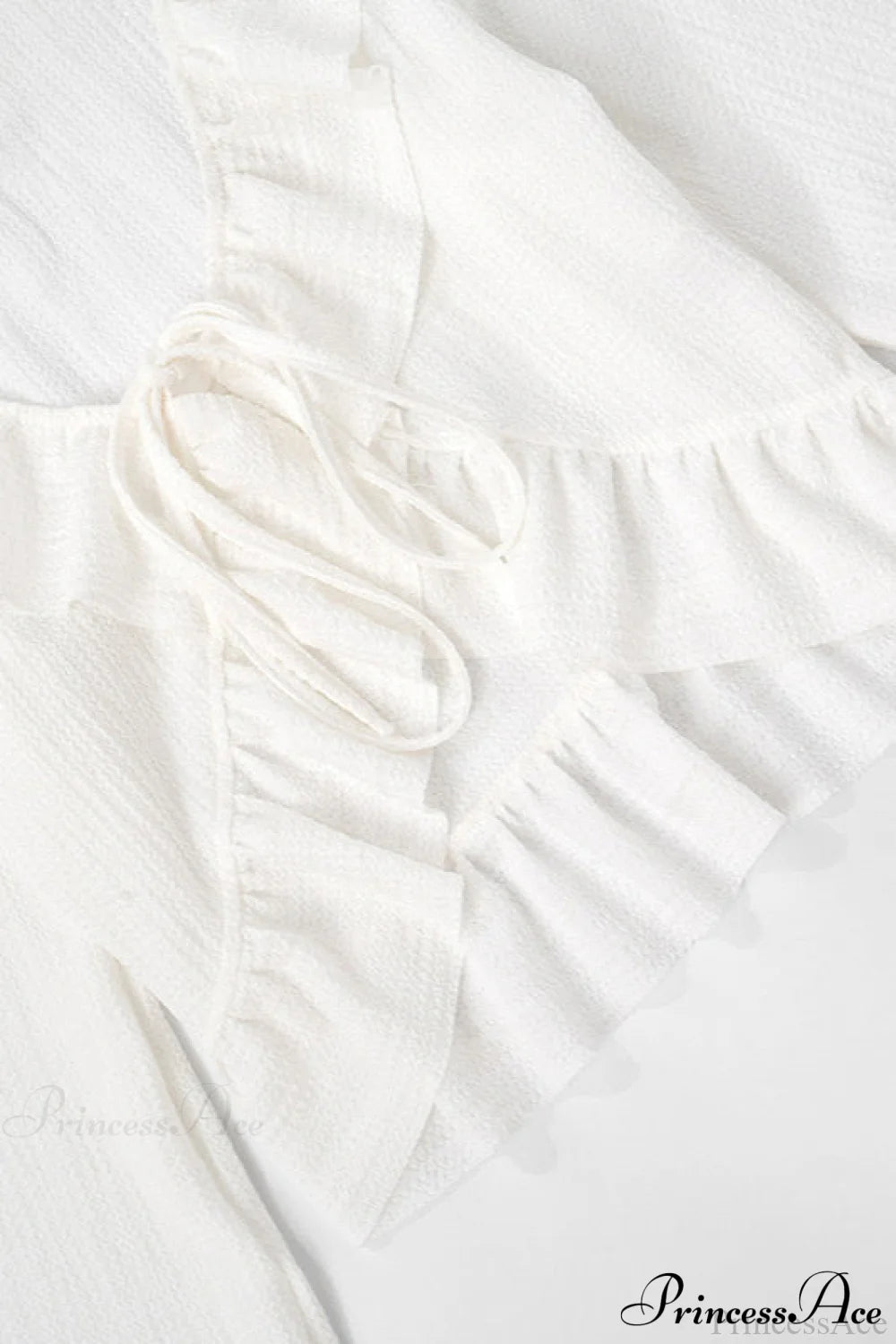 Solid Color Ruffled Tie Long Sleeve Blouse